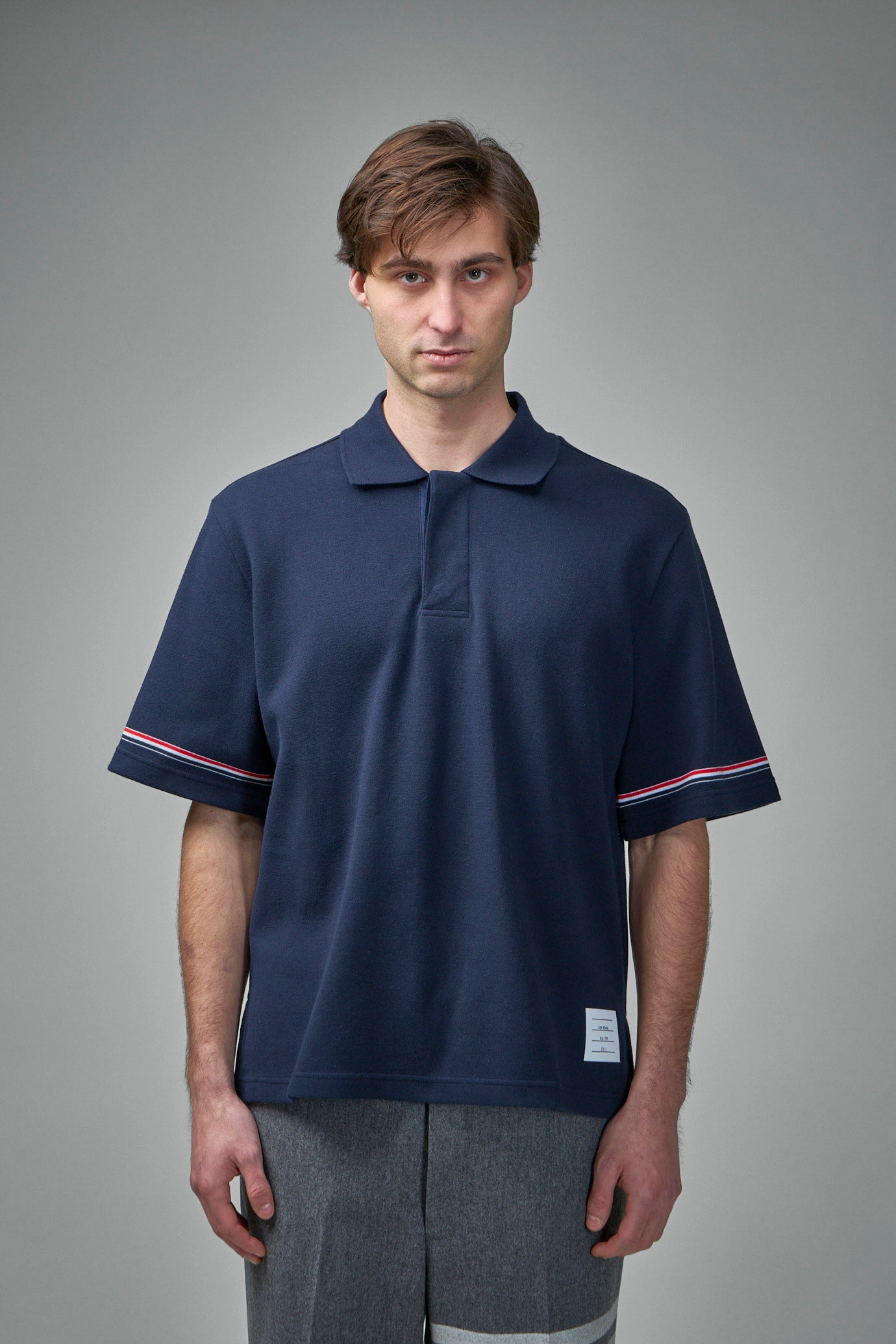 Kurzärmliges Poloshirt im Rugby-Schnitt aus Baumwoll-Interlock