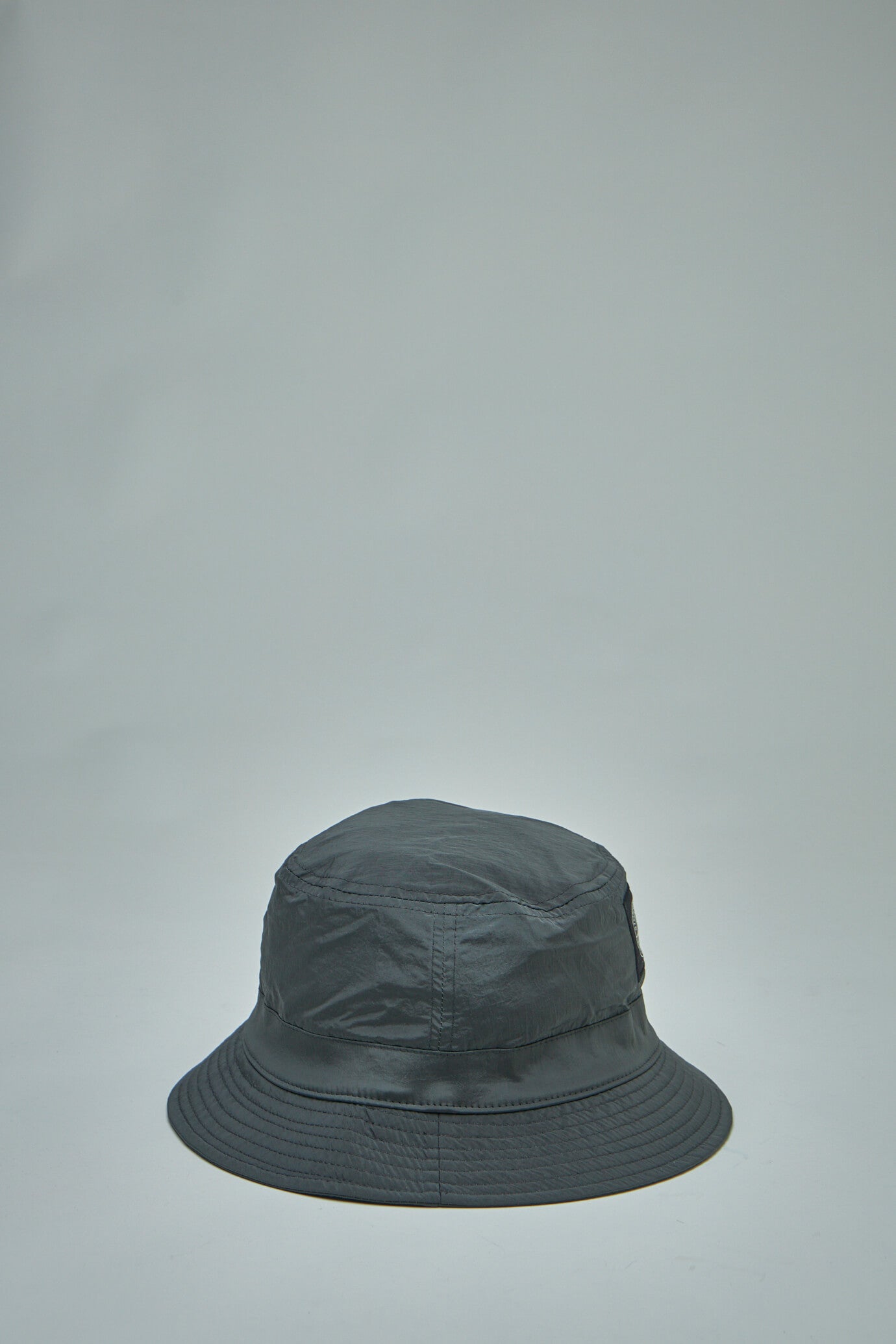 Nylon Metal in Econyl® Regenerated Bucket Hat