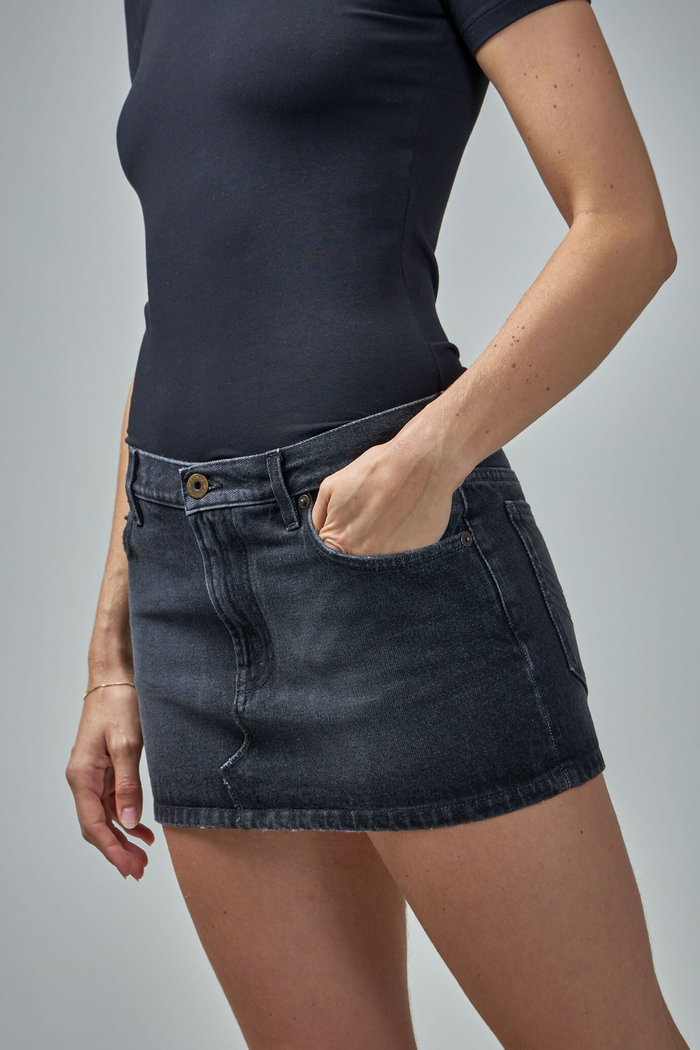 Denim Mini Skirt with Leather Pocket