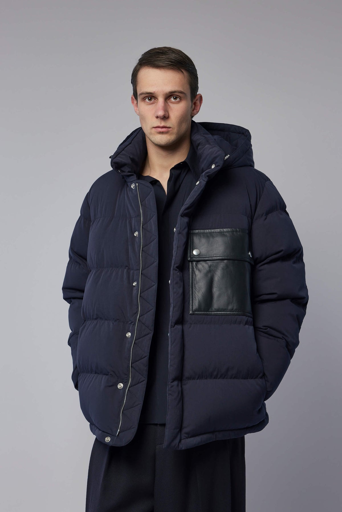 Bottega Veneta Down tech cotton puffer jacket in dark blue with quilted design