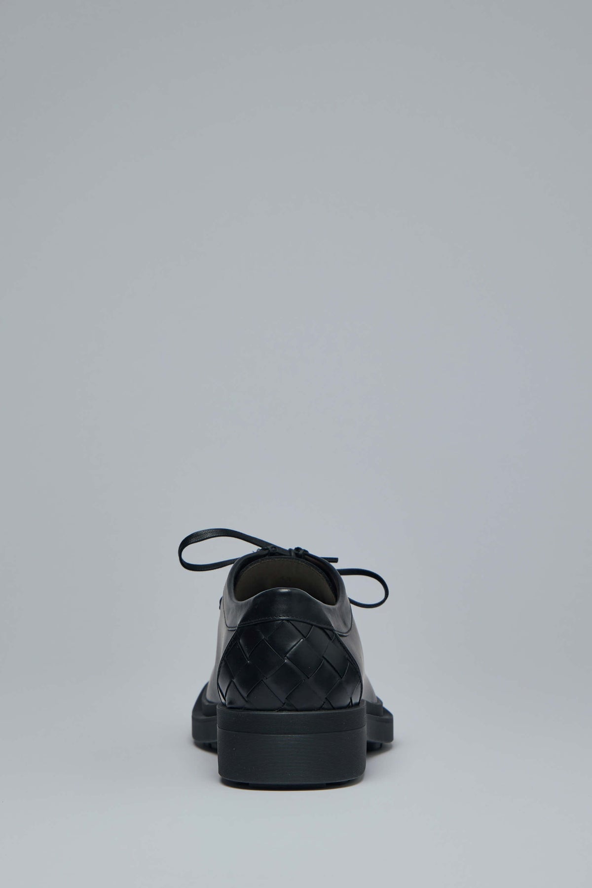 Textured rubber sole detail of Bottega Veneta Ben lace-up shoes