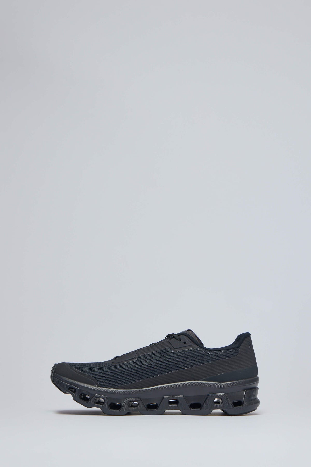 Close-up of Cloudmonster sole technology with enhanced traction pattern