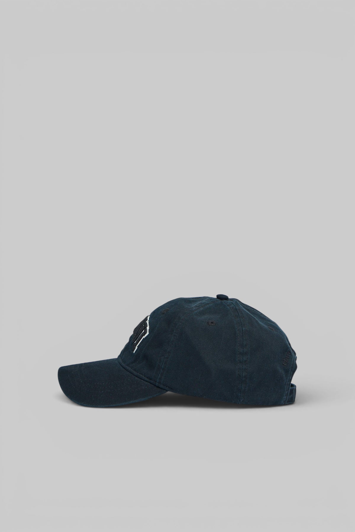 Back view of Ganni cotton canvas cap displaying brand craftsmanship
