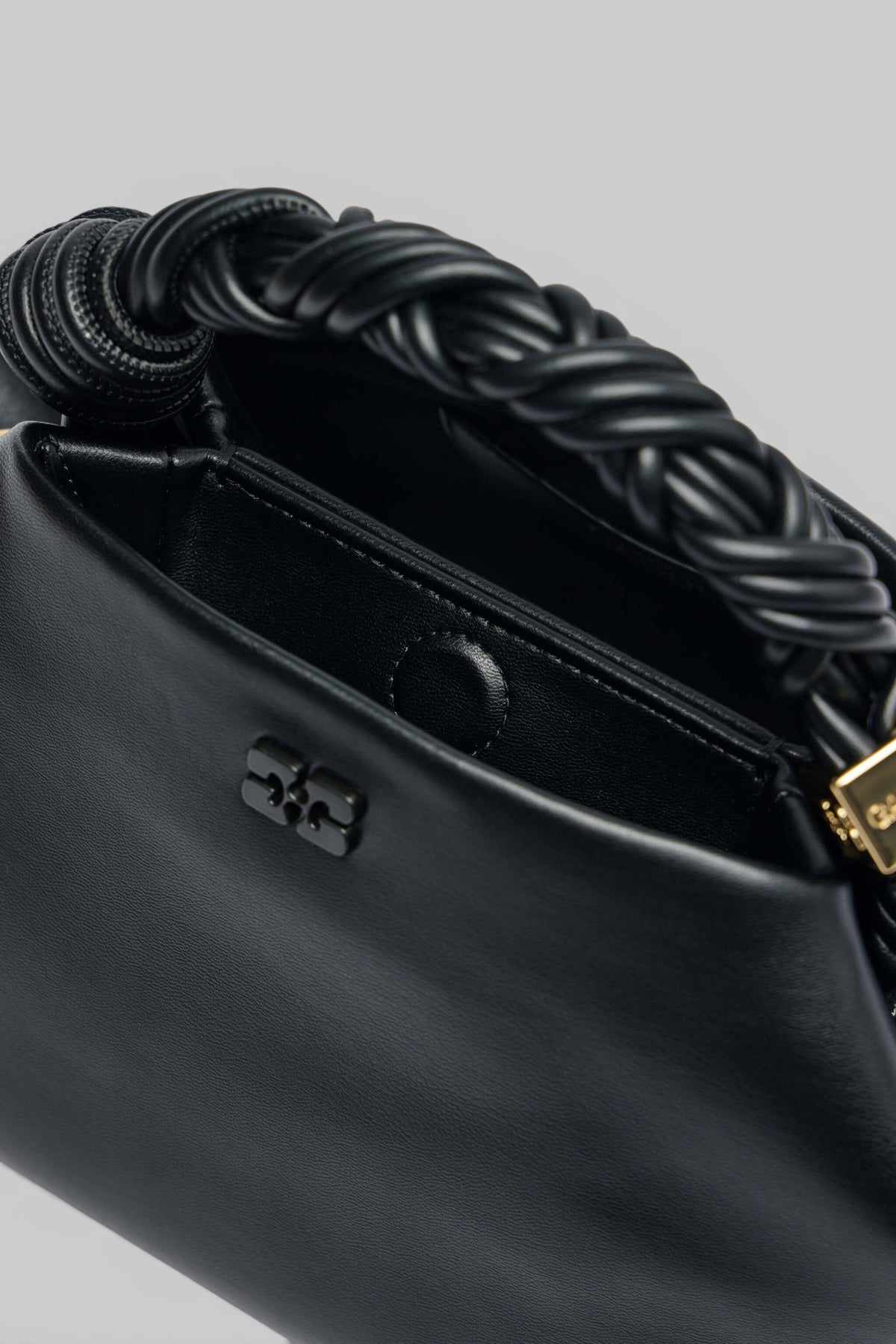 Ganni Bou Bag Small styled with evening outfit showing versatility