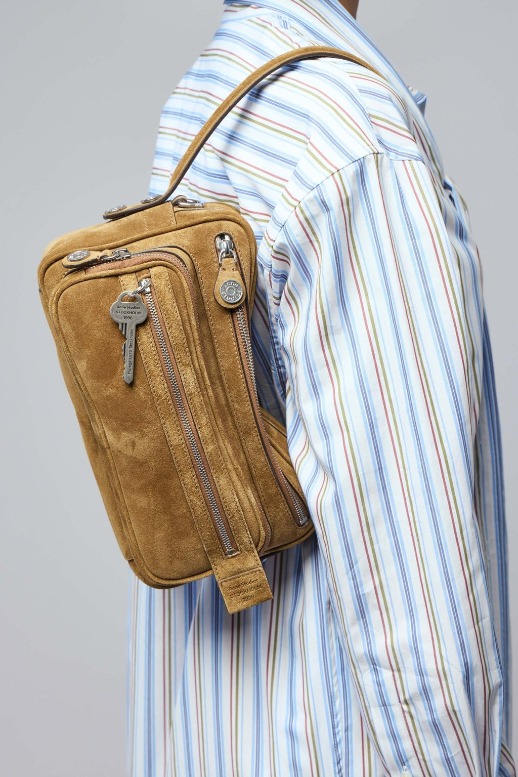 Acne Studios - Camero Party Suede V - LABELS - Detail shot of silver metal zipper and decorative keychain on luxury shoulder bag