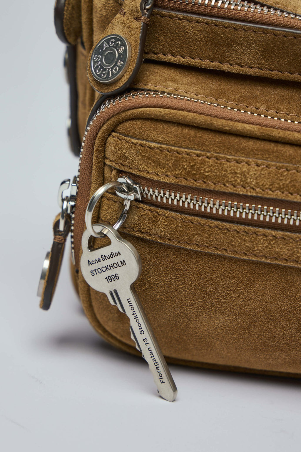 Acne Studios - Camero Party Suede V - LABELS - Interior view showing nylon lining and organized compartments of Acne Studios bag