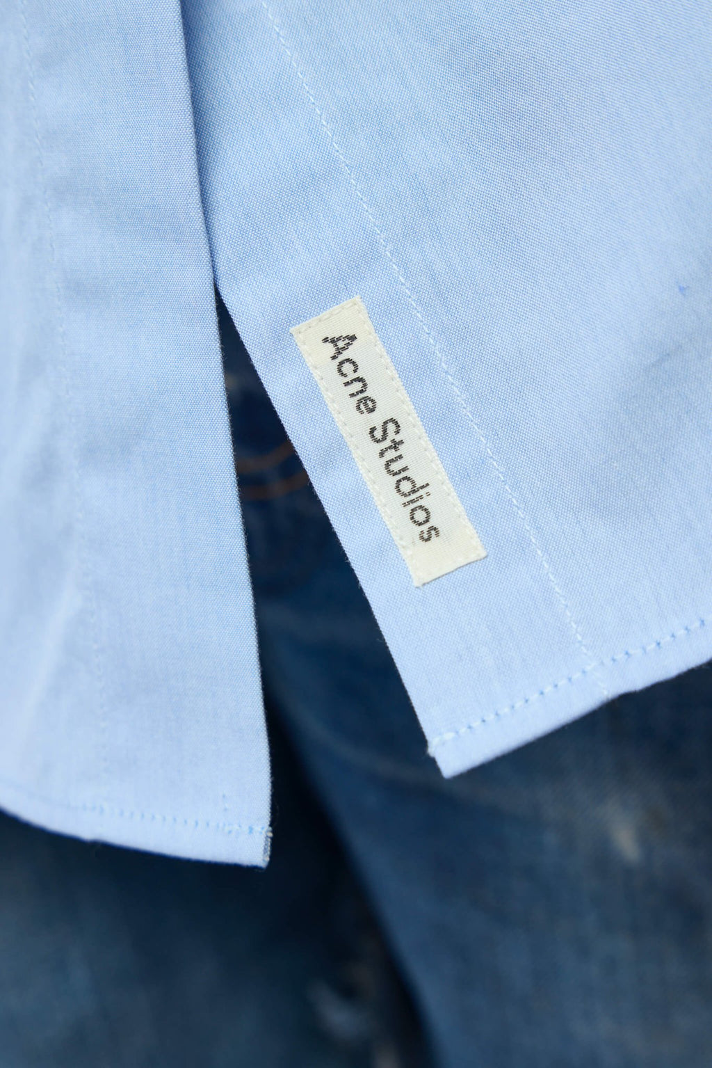 Acne Studios - Layered button‑up - LABELS - Detail shot of pointed collar on Acne Studios cotton blouse