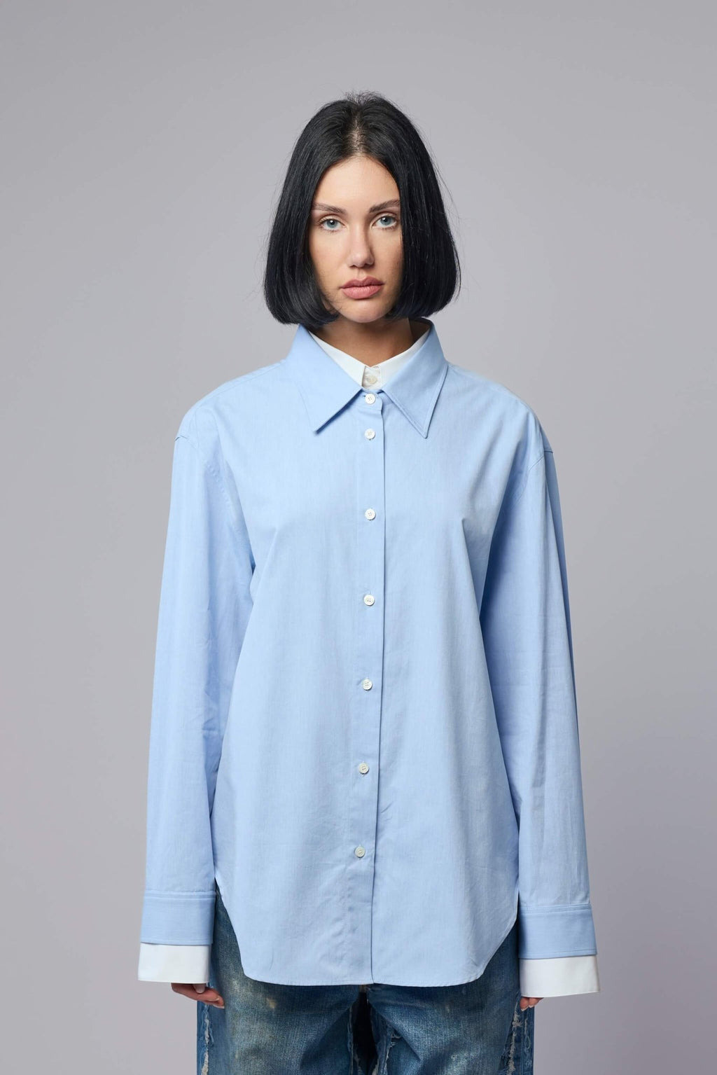 Acne Studios - Layered button‑up - LABELS - Close-up of white button details on Acne Studios cotton blouse