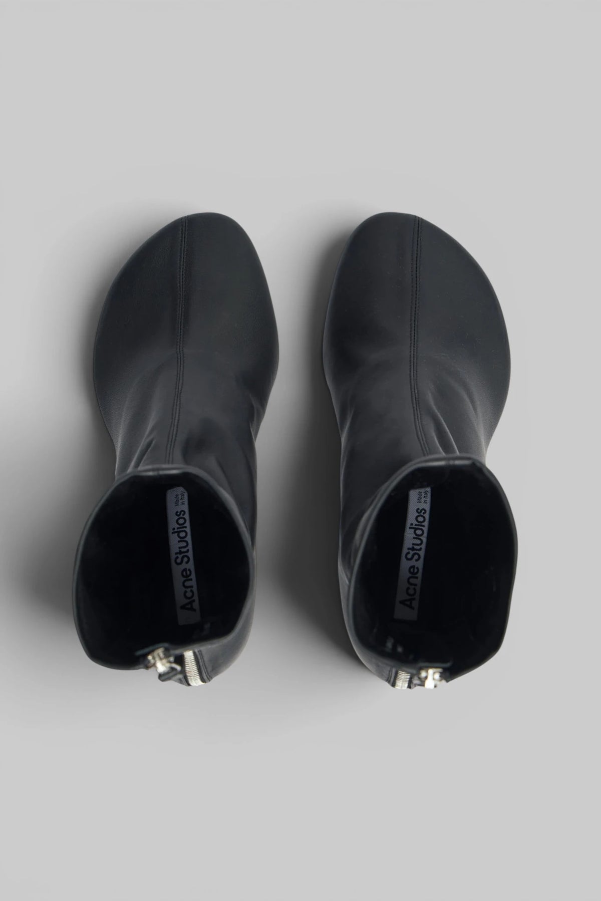 Close-up of thin heel on Acne Studios leather boot