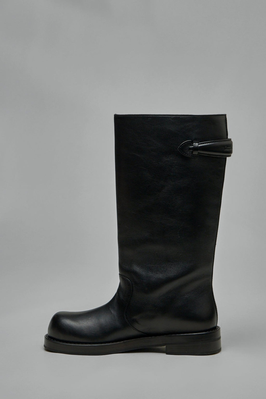 Acne Studios - Leather Boots - LABELS - Close-up of premium leather texture and craftsmanship details
