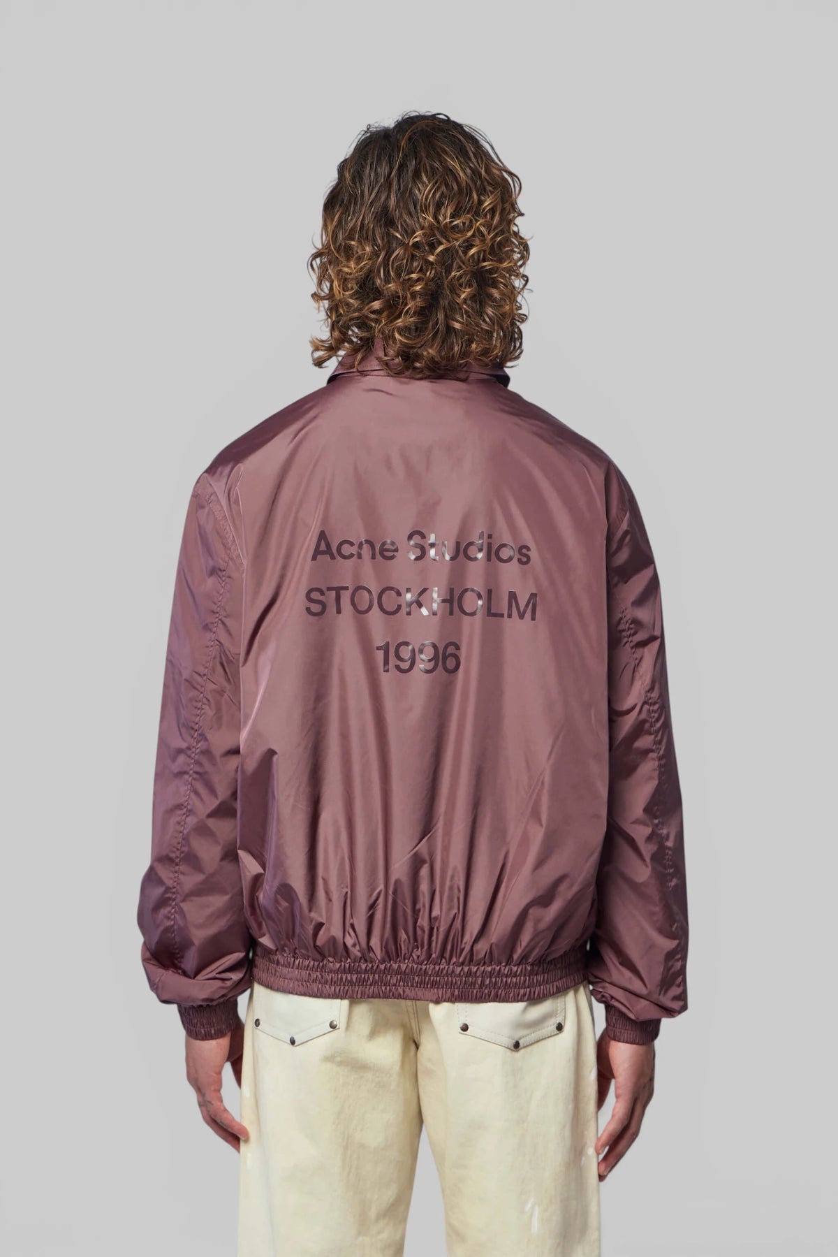 Acne Studios bomber jacket styled with tailored trousers, view 5