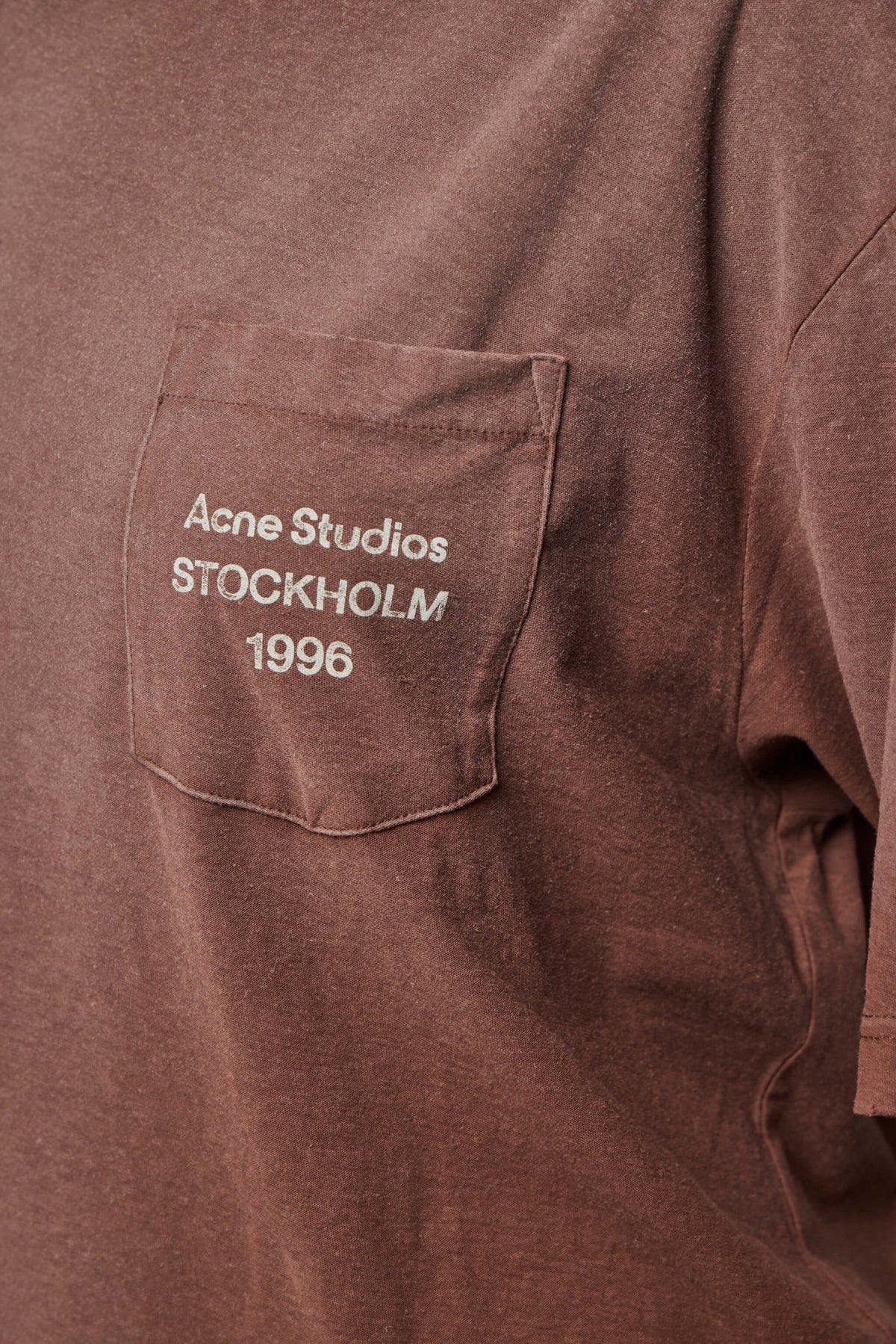 Back view of Acne Studios cotton t-shirt showing straight hemline