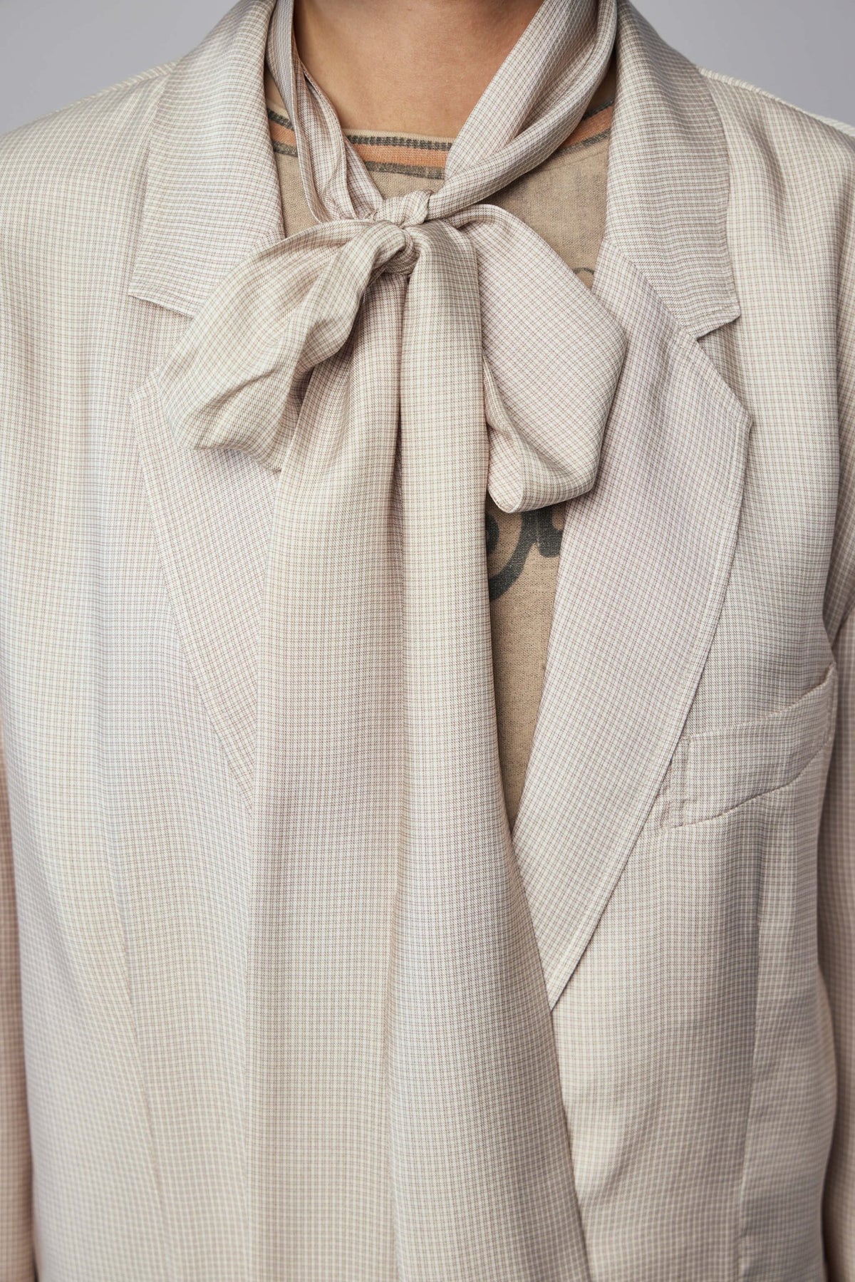 Side view showing soft shoulder structure and tailored silhouette
