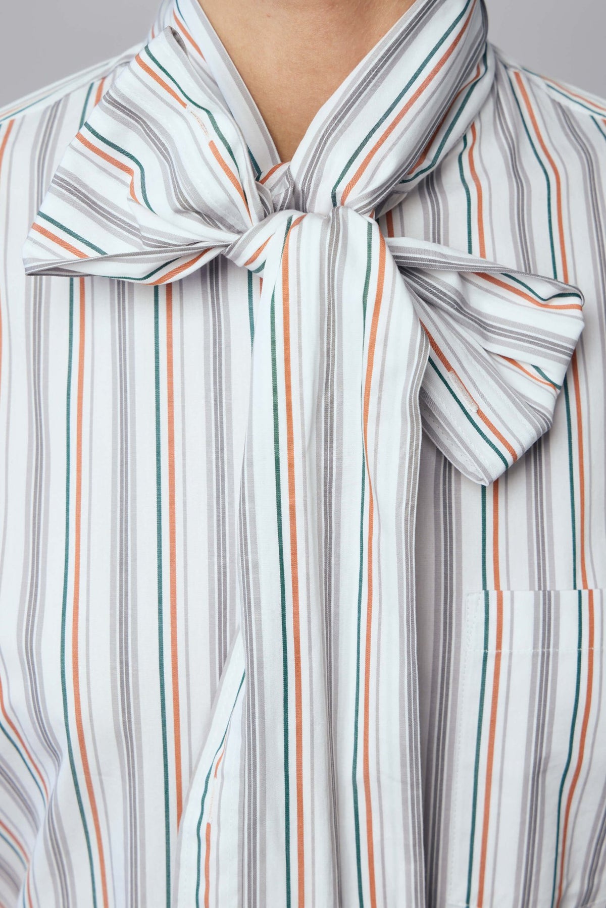 Back view of Acne Studios striped blouse showing button closure