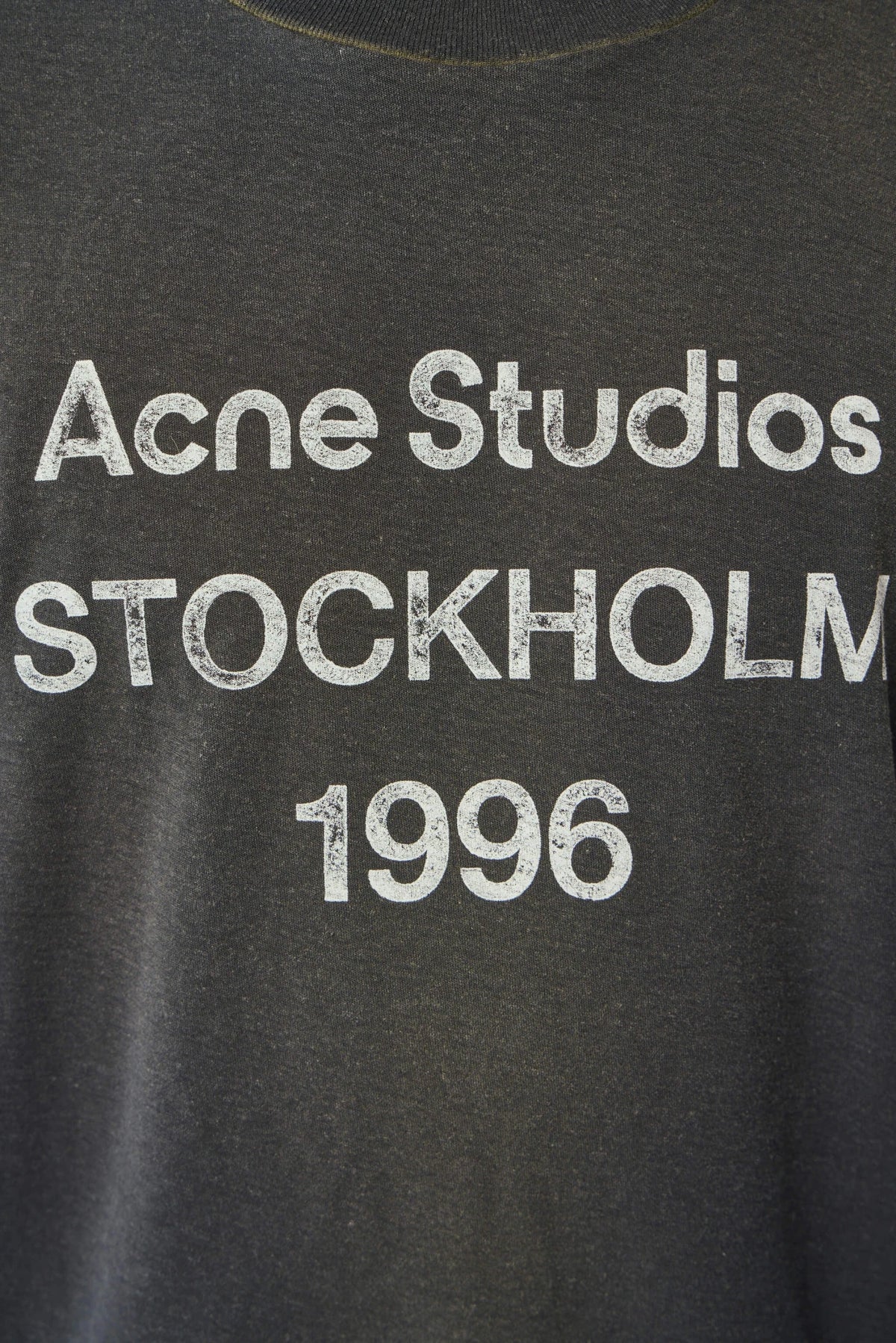 Acne Studios relaxed fit tee folded showing full silhouette
