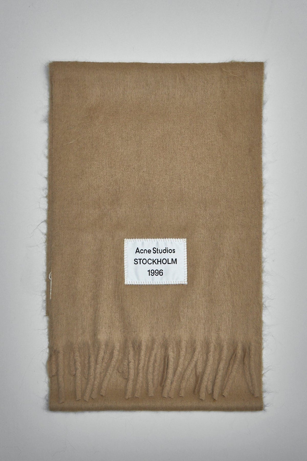 Acne Studios wool mohair scarf in neutral tone with embroidered logo label