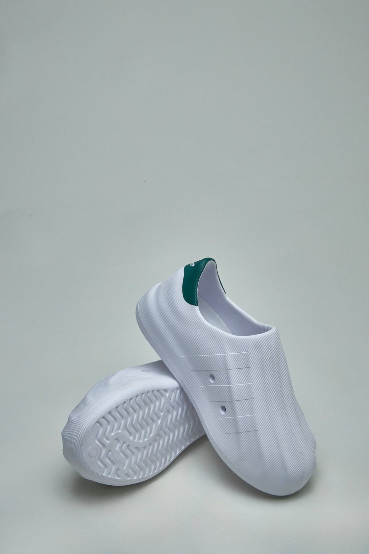 Full profile shot of Adidas AdiFOM Superstar low top sneakers
