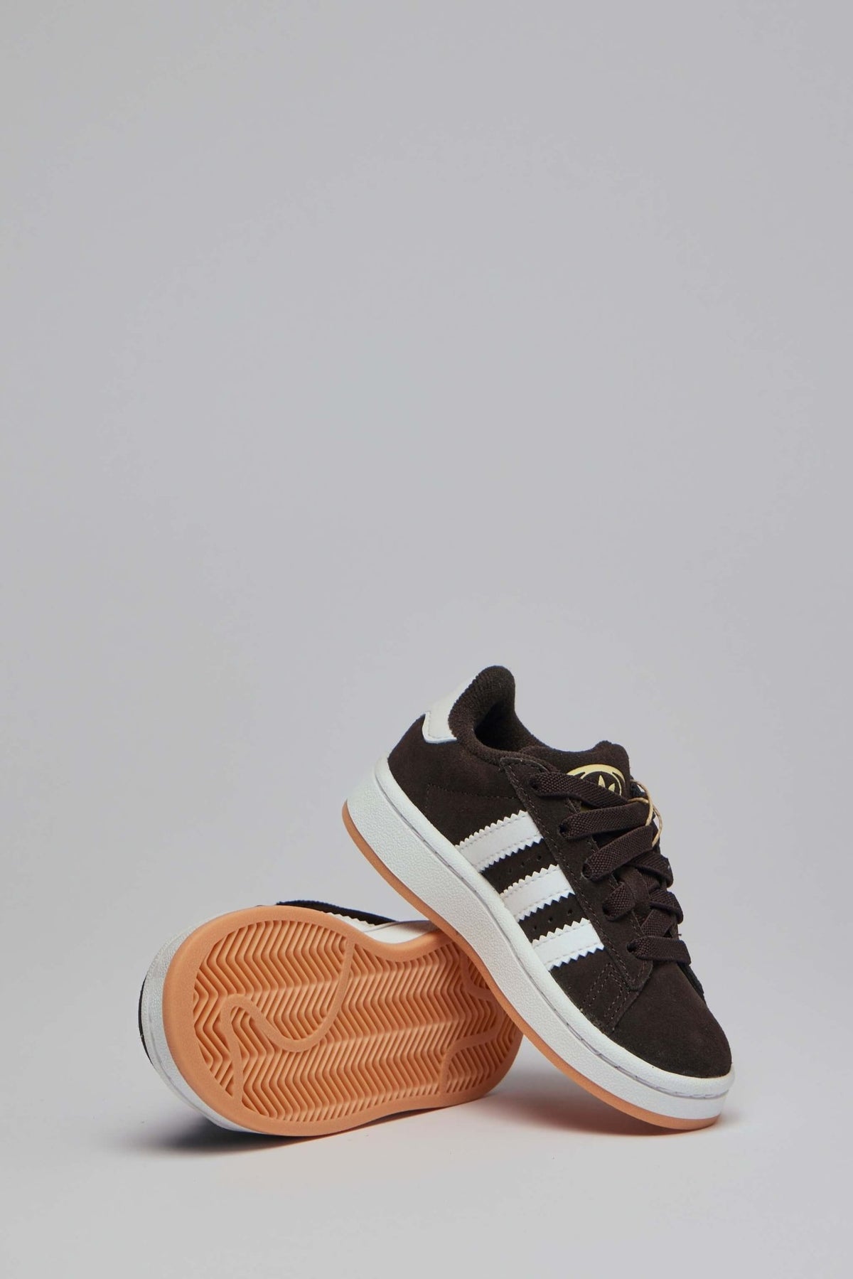 Full pair of Adidas Originals Campus sneakers on white background