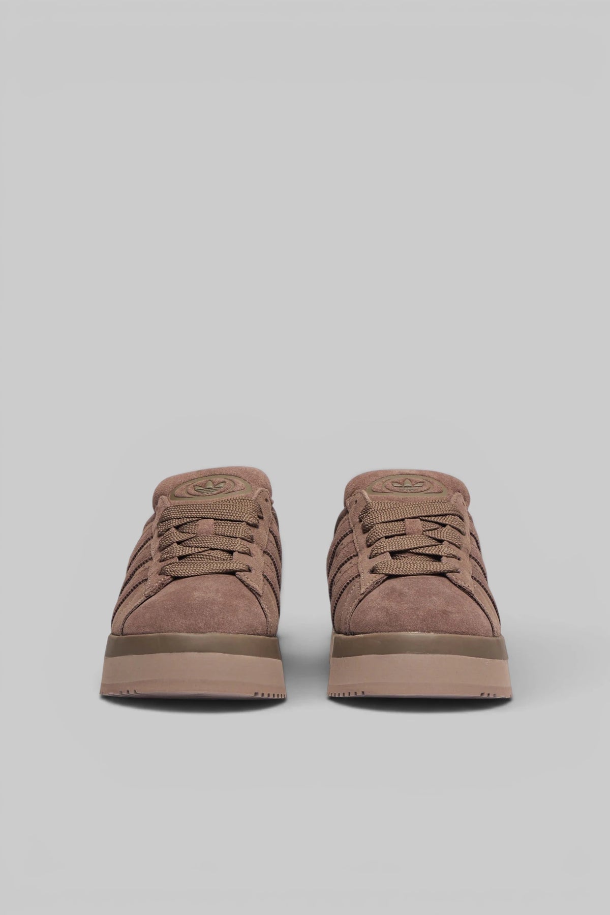 Side view of Adidas Originals suede low top sneaker