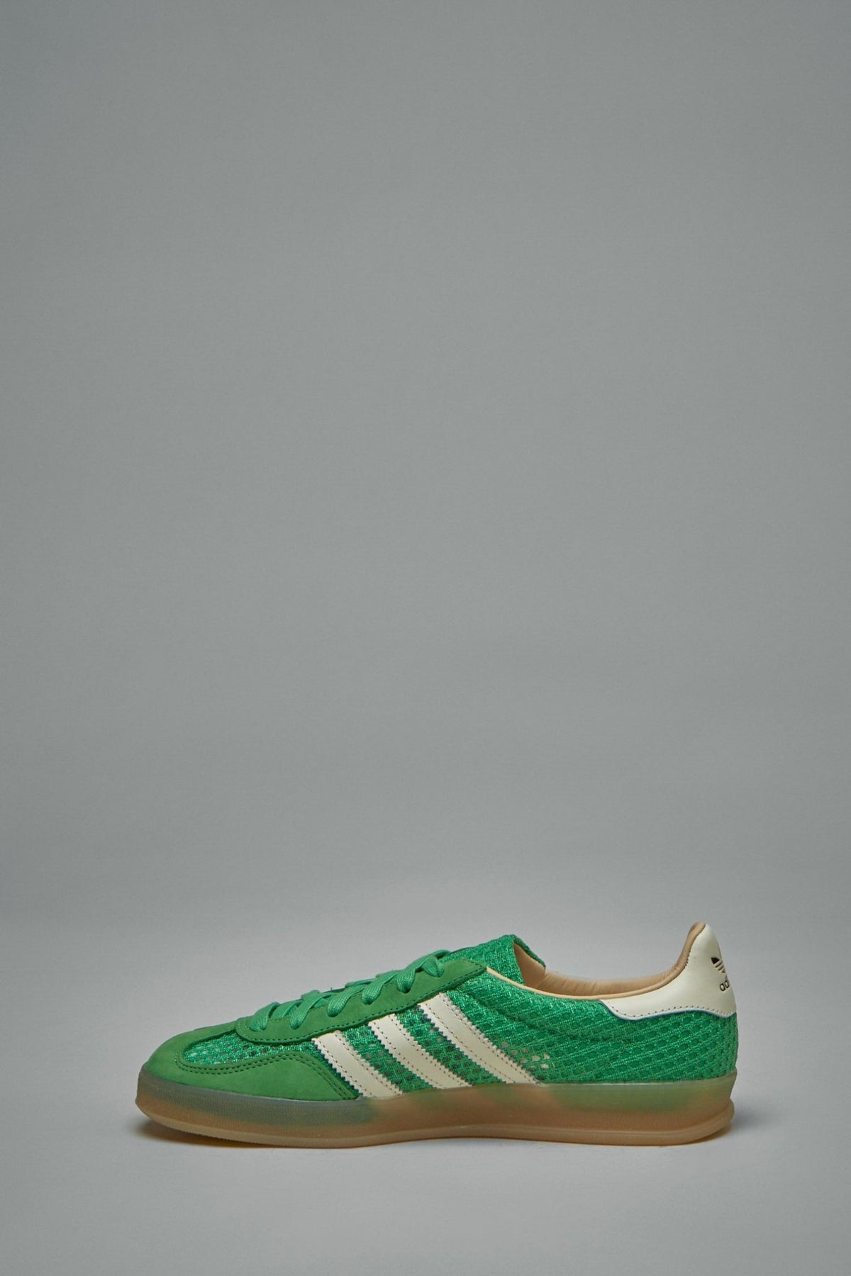 Close-up of premium fabric upper construction and lace-up closure