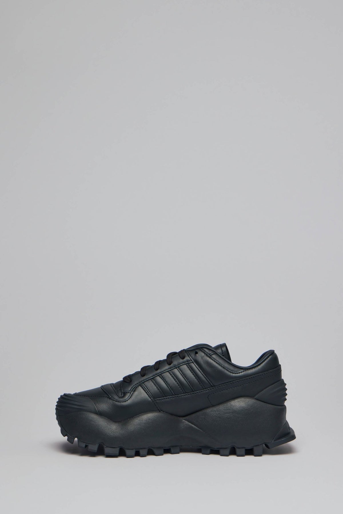 Detail shot of textured side panel and subtle branding on Chavarria Forum Sneaker