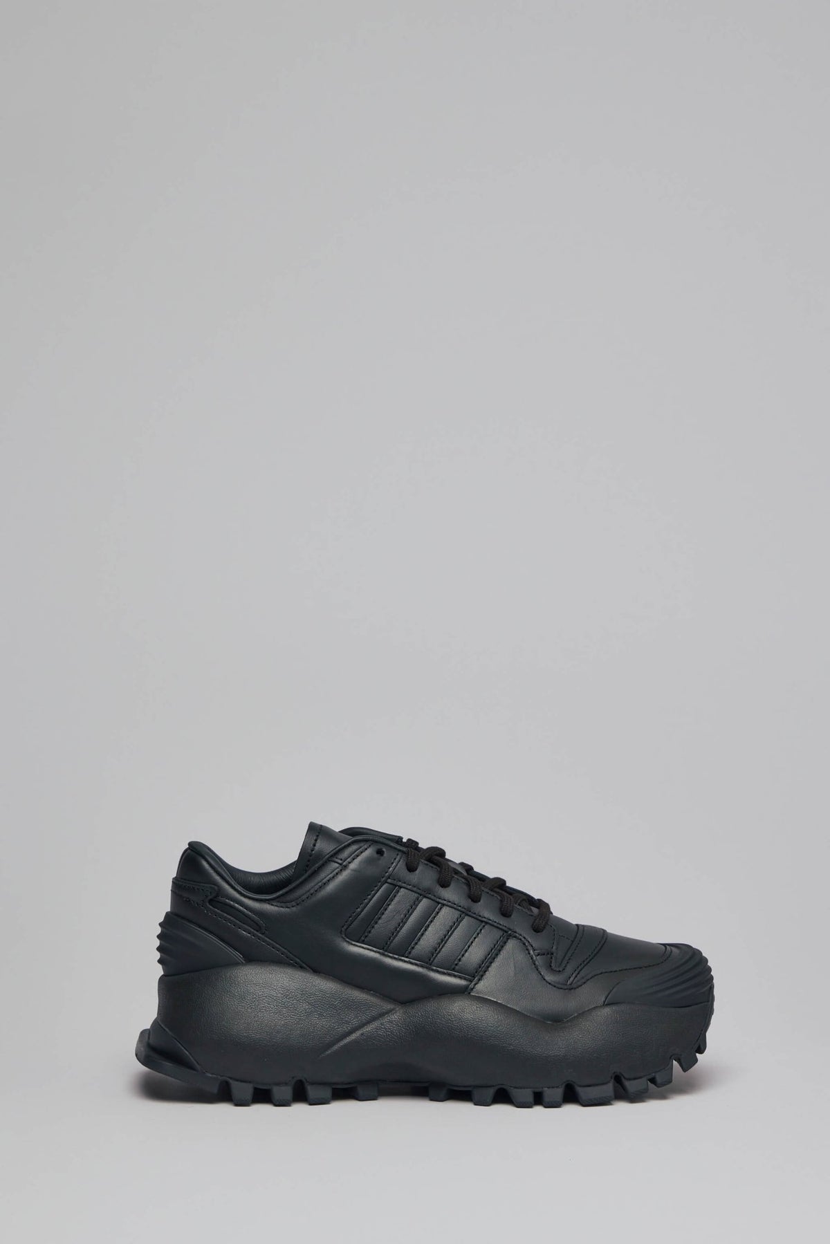 Adidas Originals x Willy Chavarria Chavarria Forum Sneaker in black leather with textured side panels