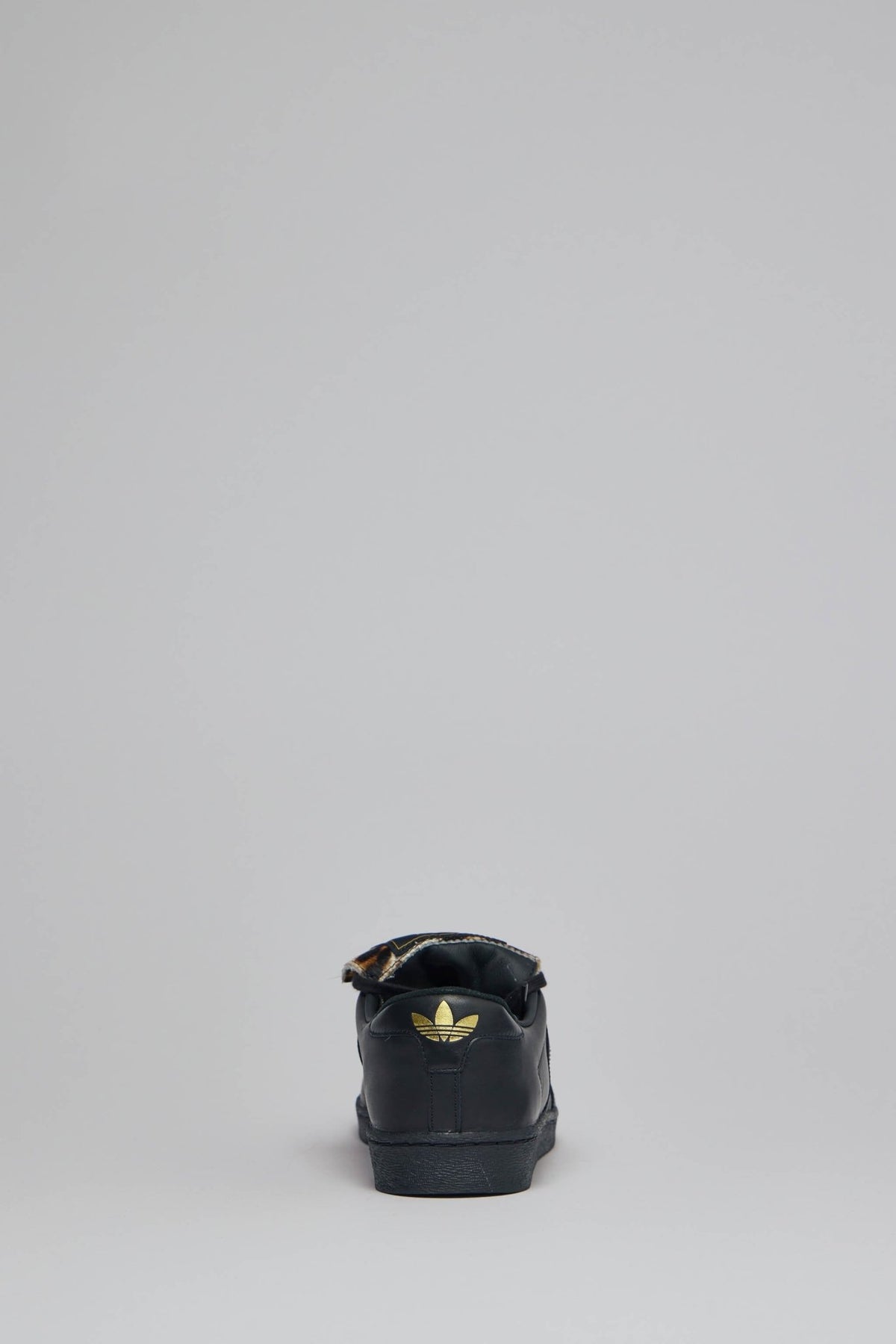 Flat black rubber sole detail of Adidas Originals collaboration sneaker