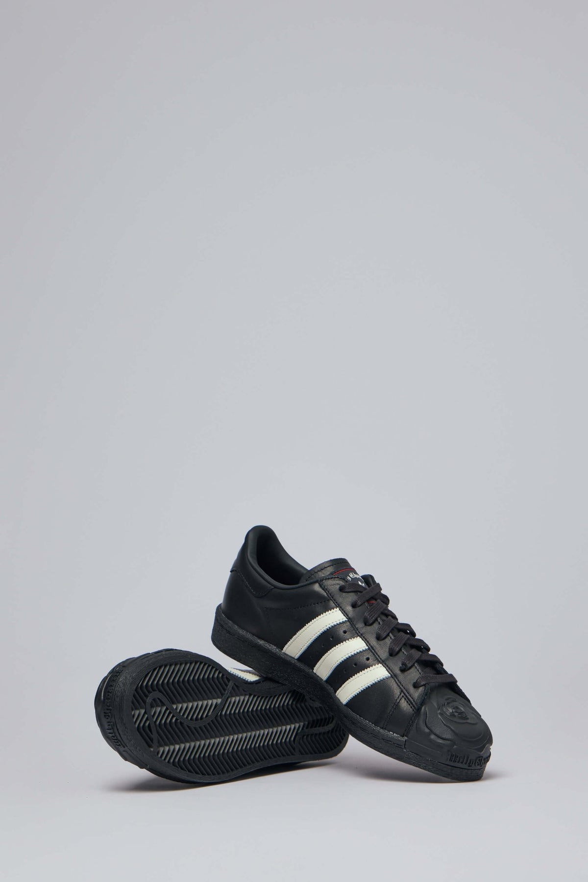 Sole view of textured rubber outsole on Adidas Originals collaboration sneakers