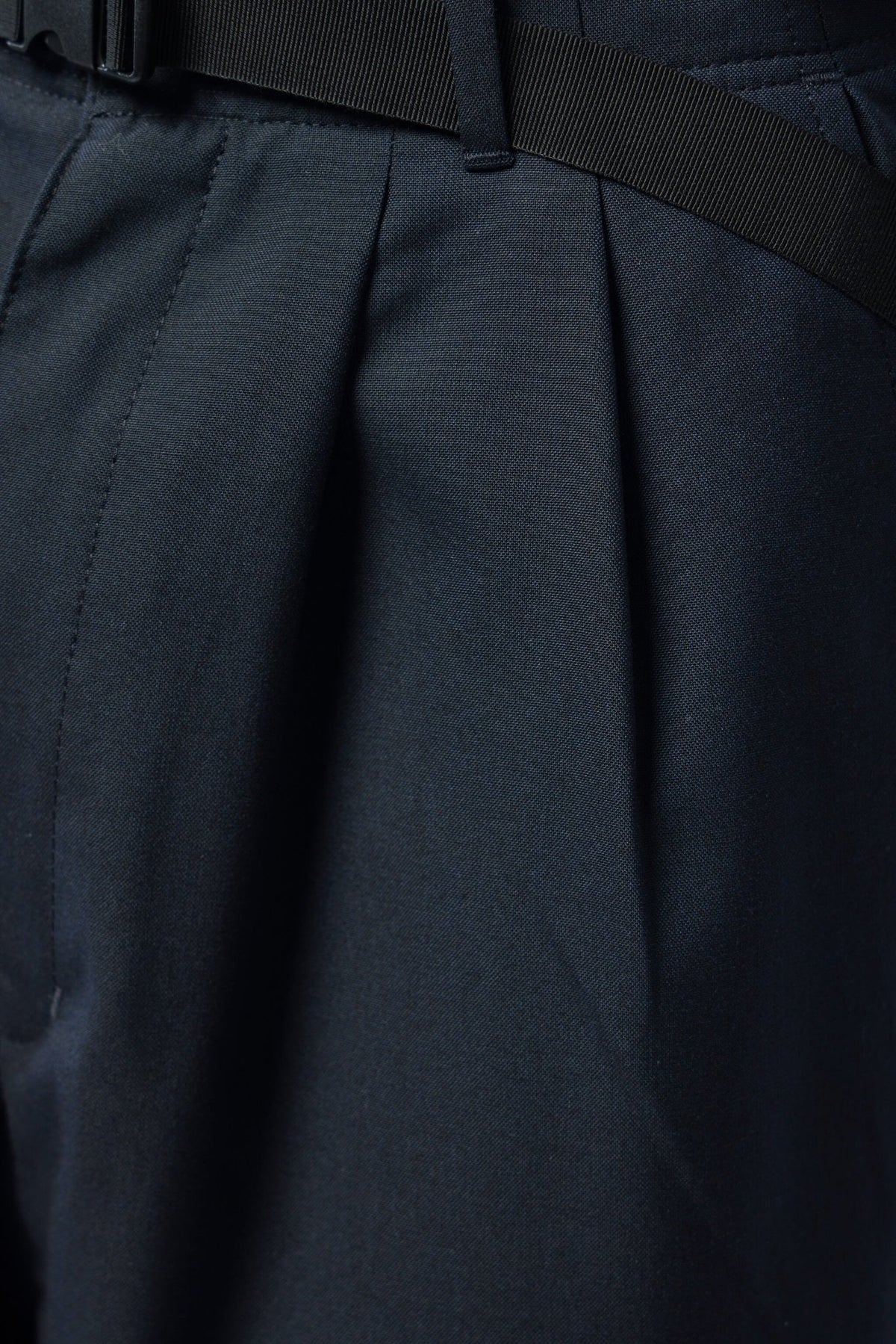 Side view showing the relaxed silhouette and contemporary fit of Matsu trousers