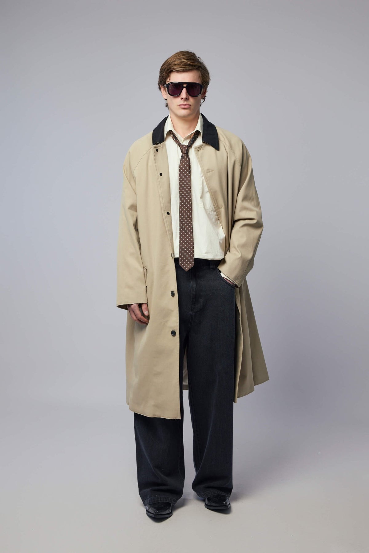 Adnym coats Rizwan design with contrasting collar and long silhouette