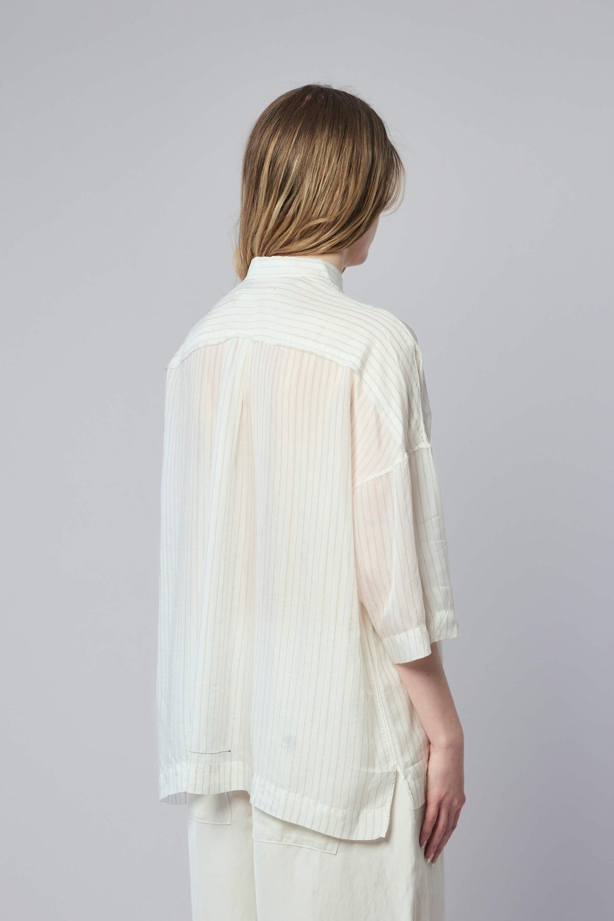 Adnym shirt fabric drape and silhouette in natural lighting