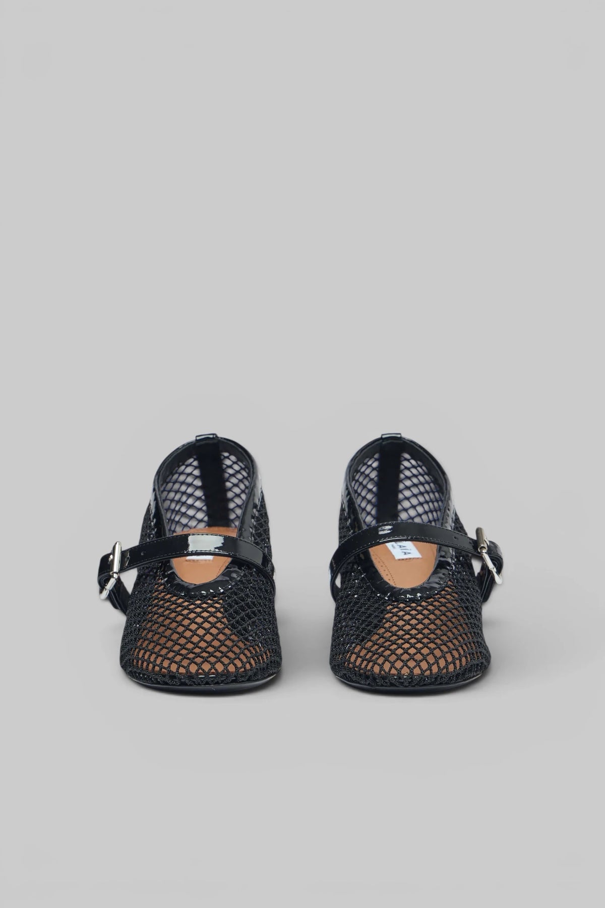 Alaïa Fishnet Pumps 55 side profile showing heel height