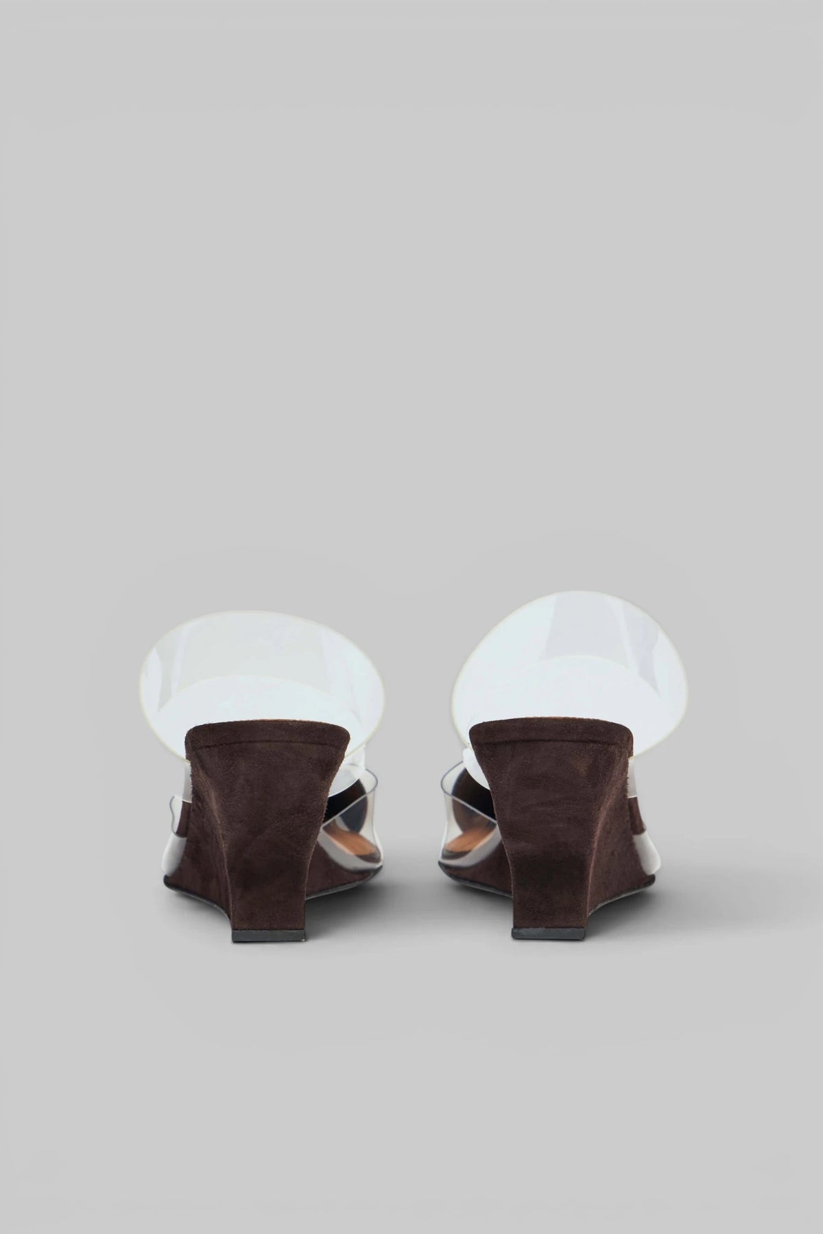 Alaïa Le Coeur Wedge Mules styled with tailored trousers
