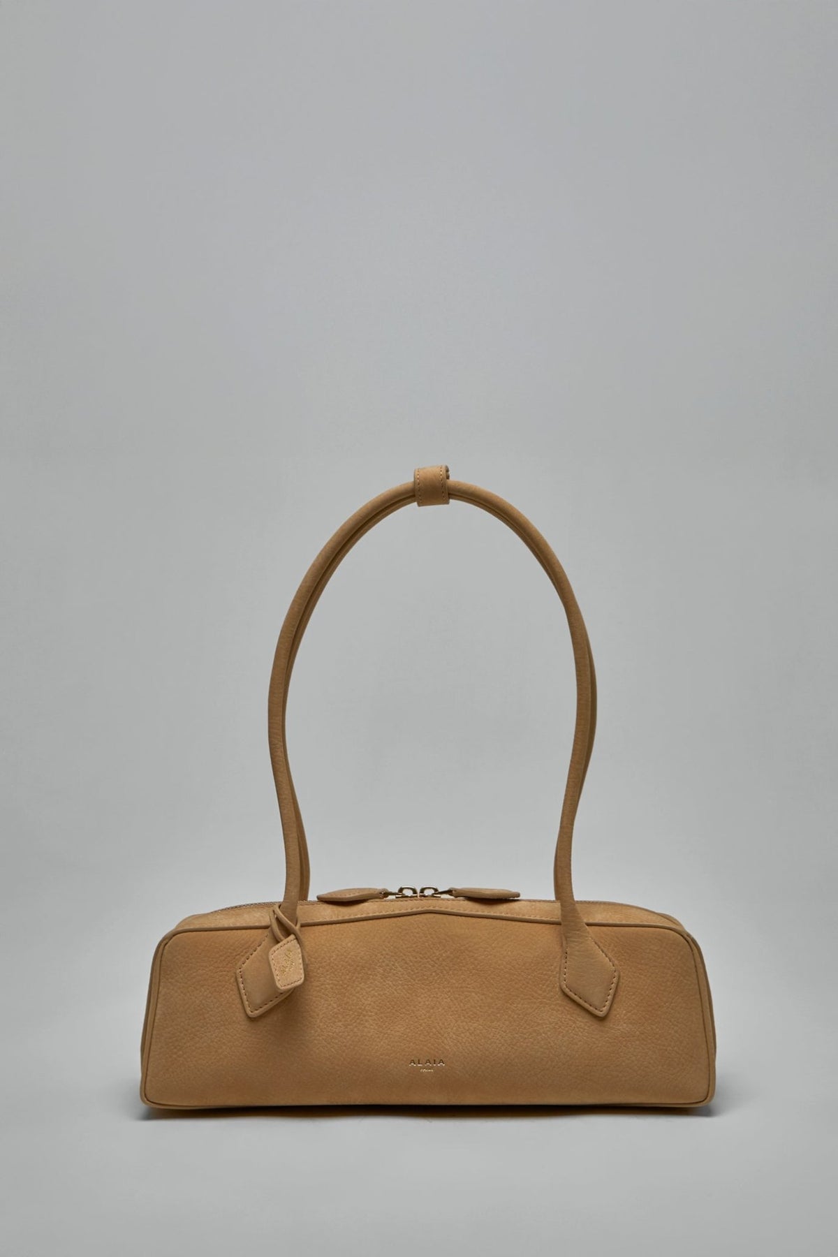 Alaïa Le Teckel Medium Bag in beige goatskin leather with gold hardware
