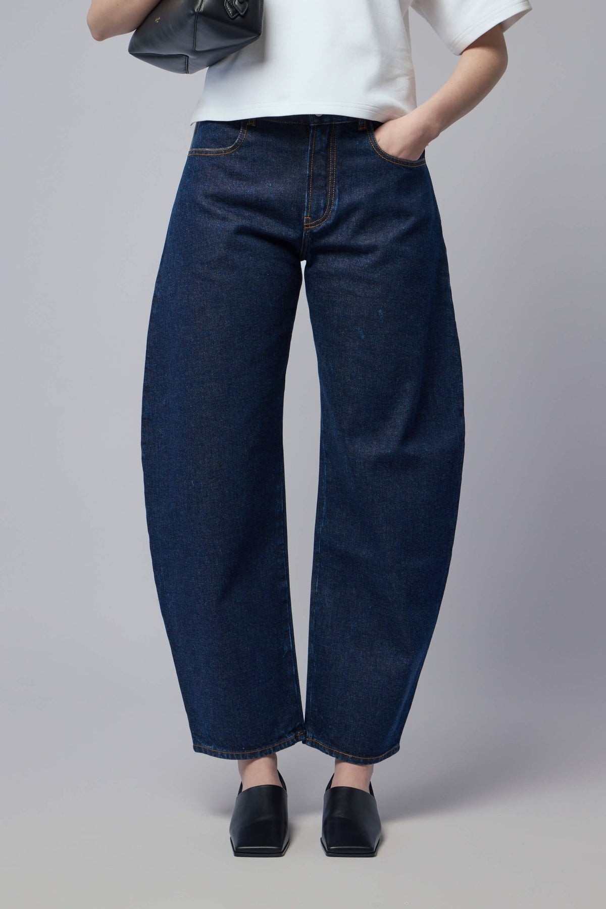 Alaïa Wide-Leg Pants in deep blue cotton denim with contrast stitching