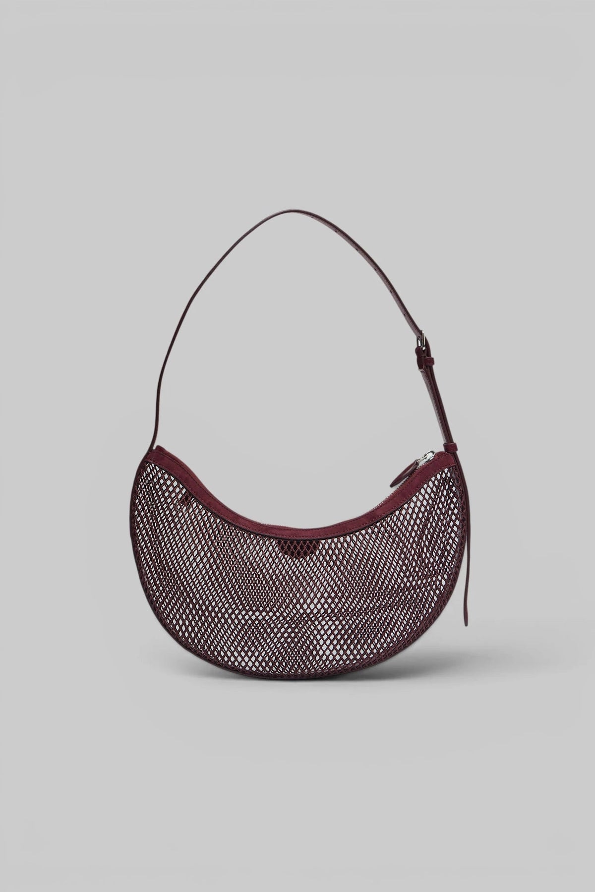 Interior polyester lining of Alaïa Demi Lune clutch