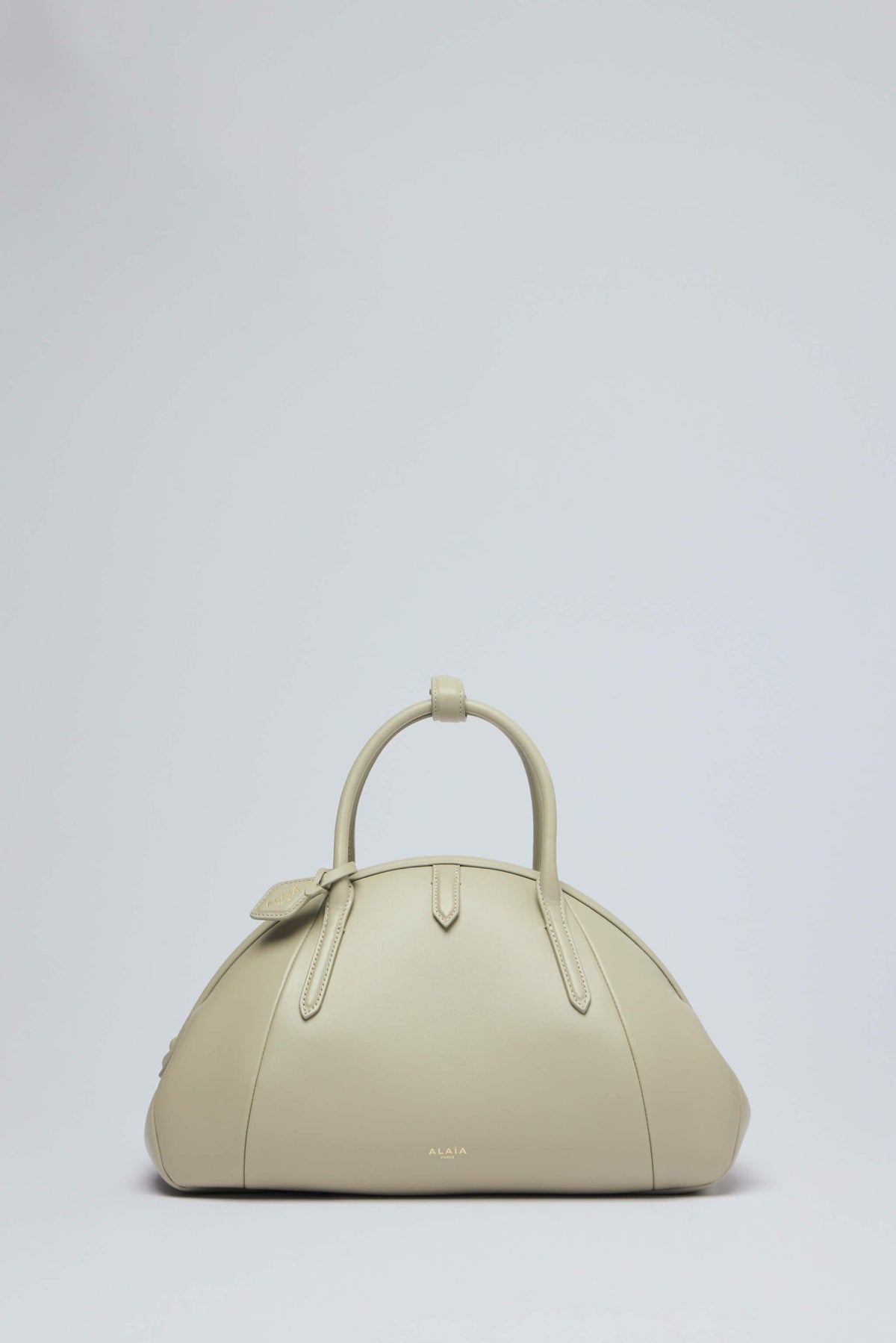 Alaïa tote bags in structured calf leather with dual top handles
