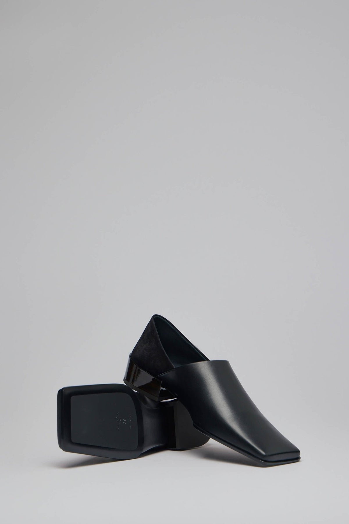 Close-up of Alaïa brand label and finishing details