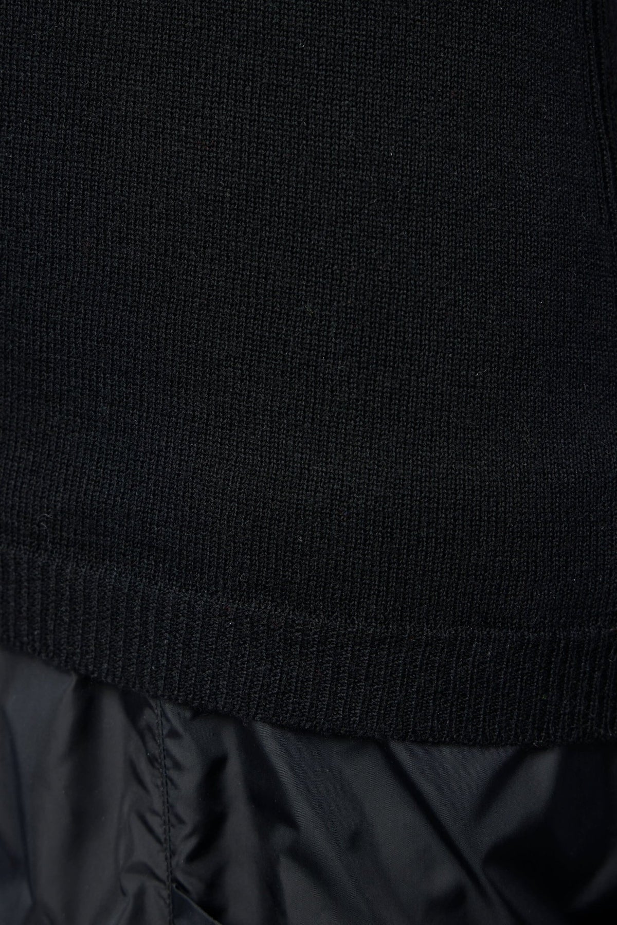 Side view of Alaïa tank top fitted design