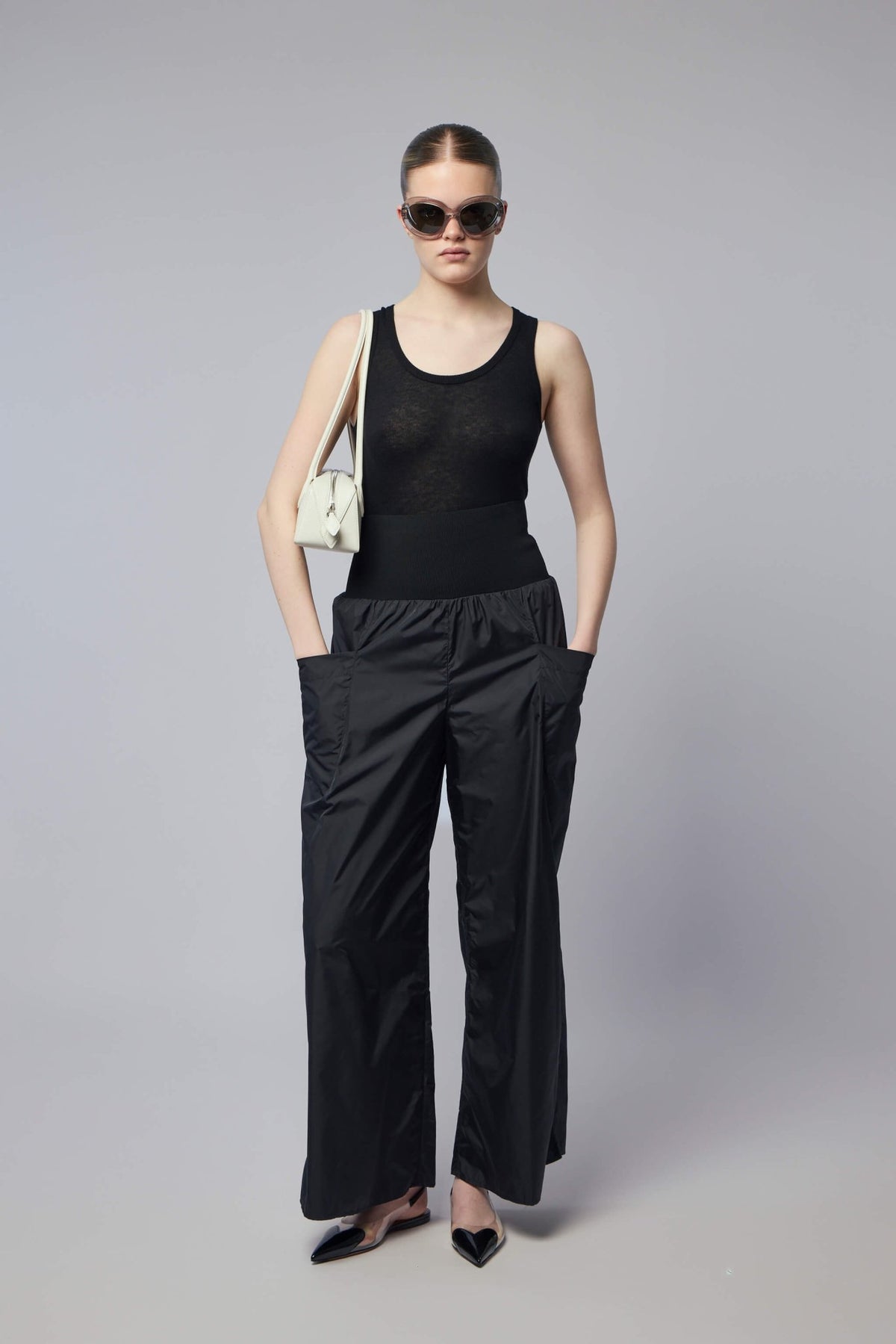 Alaïa tank top styling with layered look