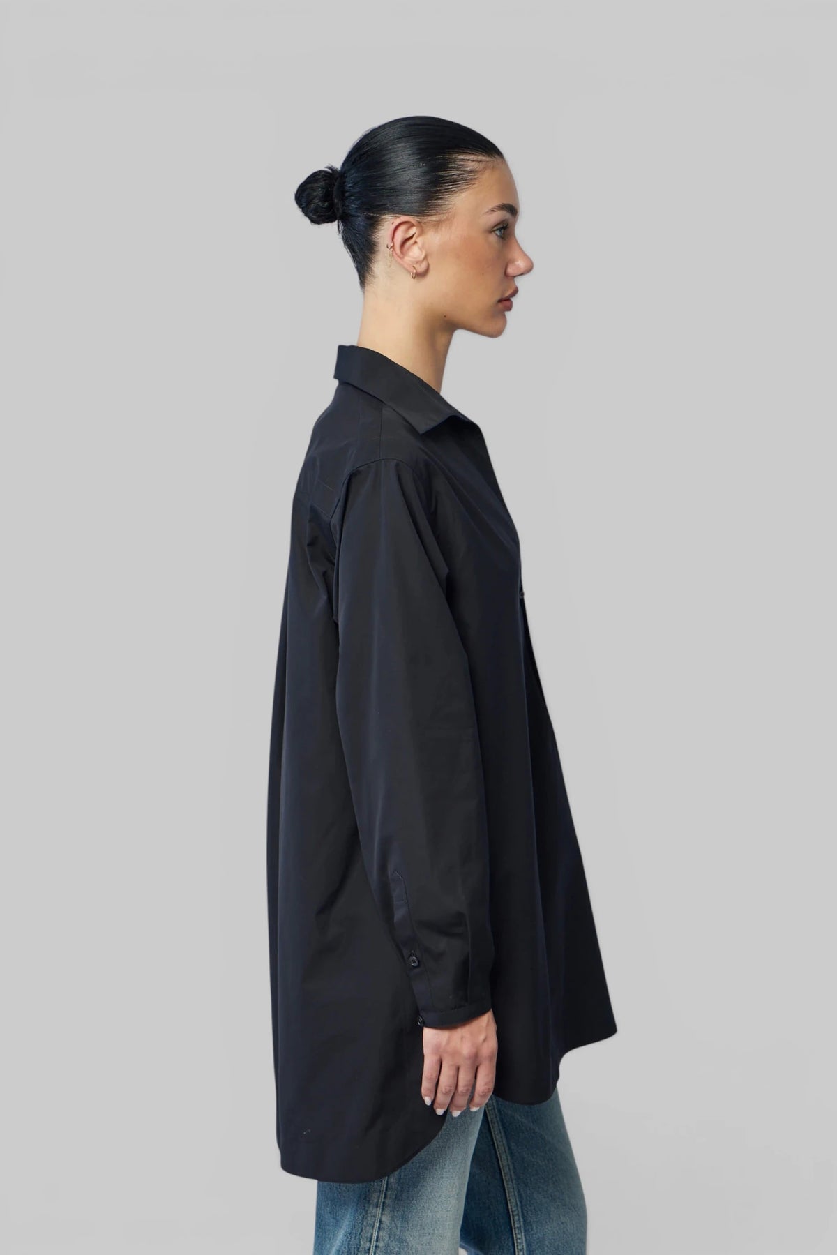 Side profile of Alaïa Tunic Shirt Cotton Poplin showing drape