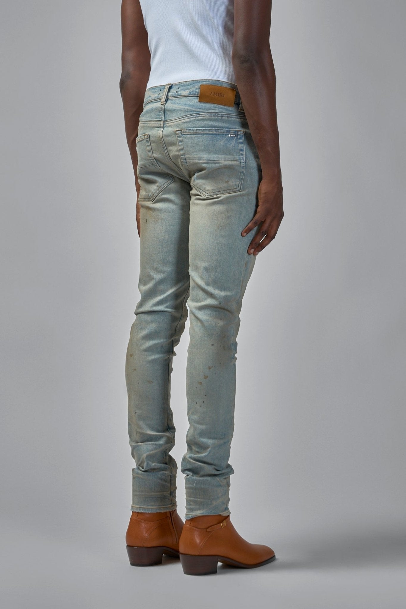 Amiri Skinny Jeans - Stack Denim with Distressed Details – LABELS