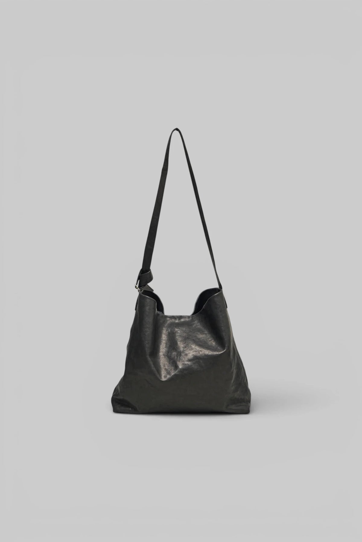 Close-up of vintage lux grained leather texture on Tosh Shoulder Bag