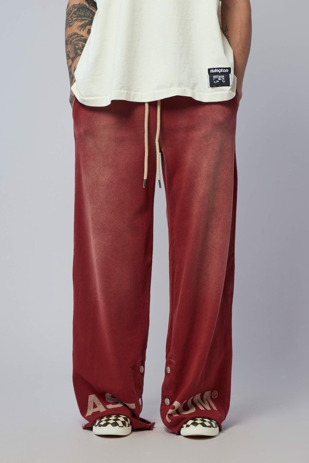 Astrum cargo pants in vibrant red with oversized fit and elastic waistband