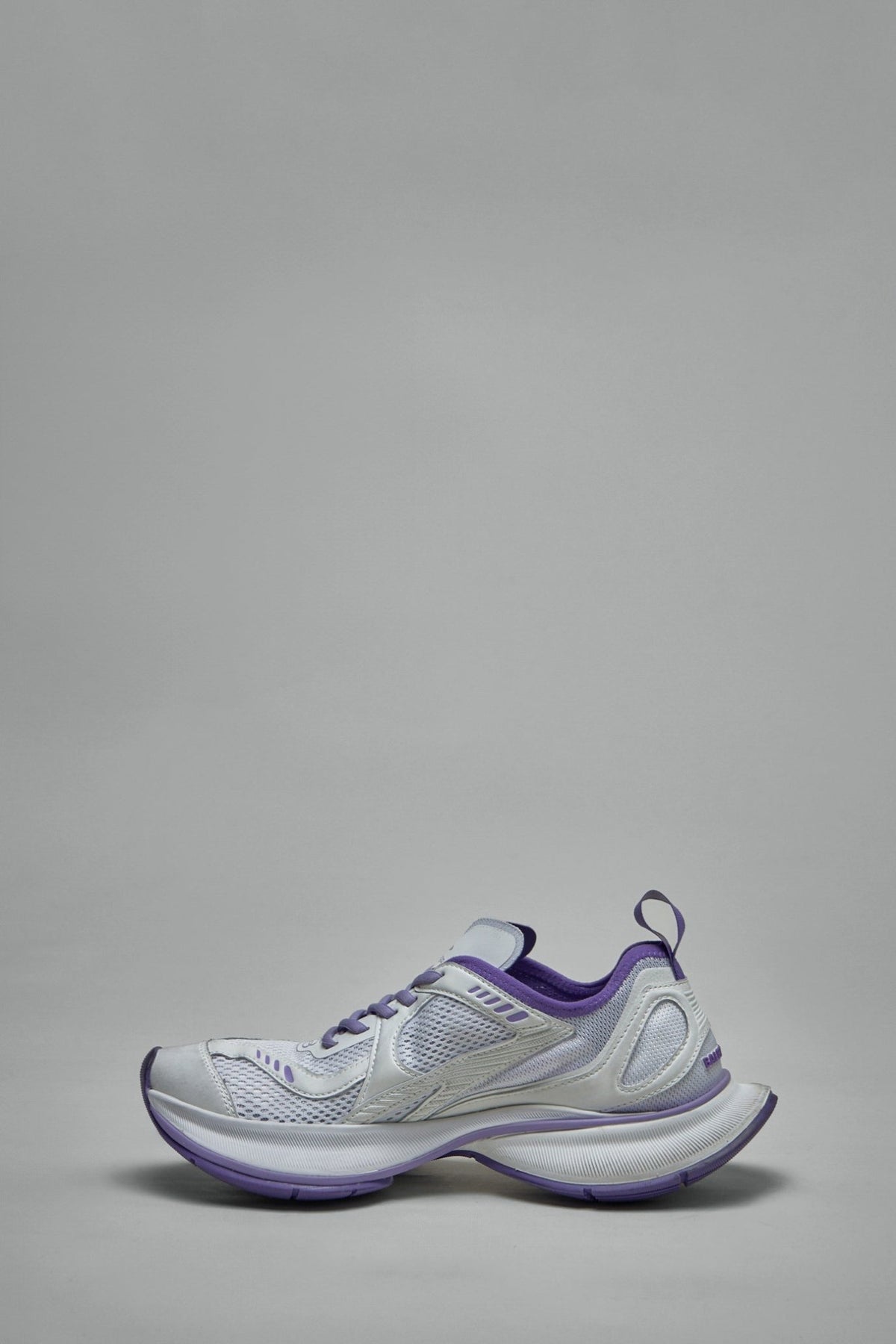 Back view of Circuit sneaker with pull-on tab and branding