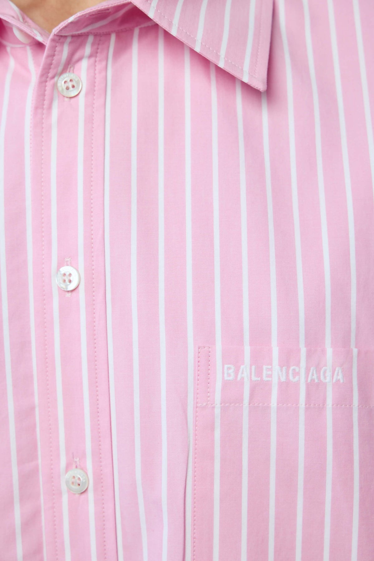 Detail shot of pink stripe pattern on Balenciaga cotton shirt