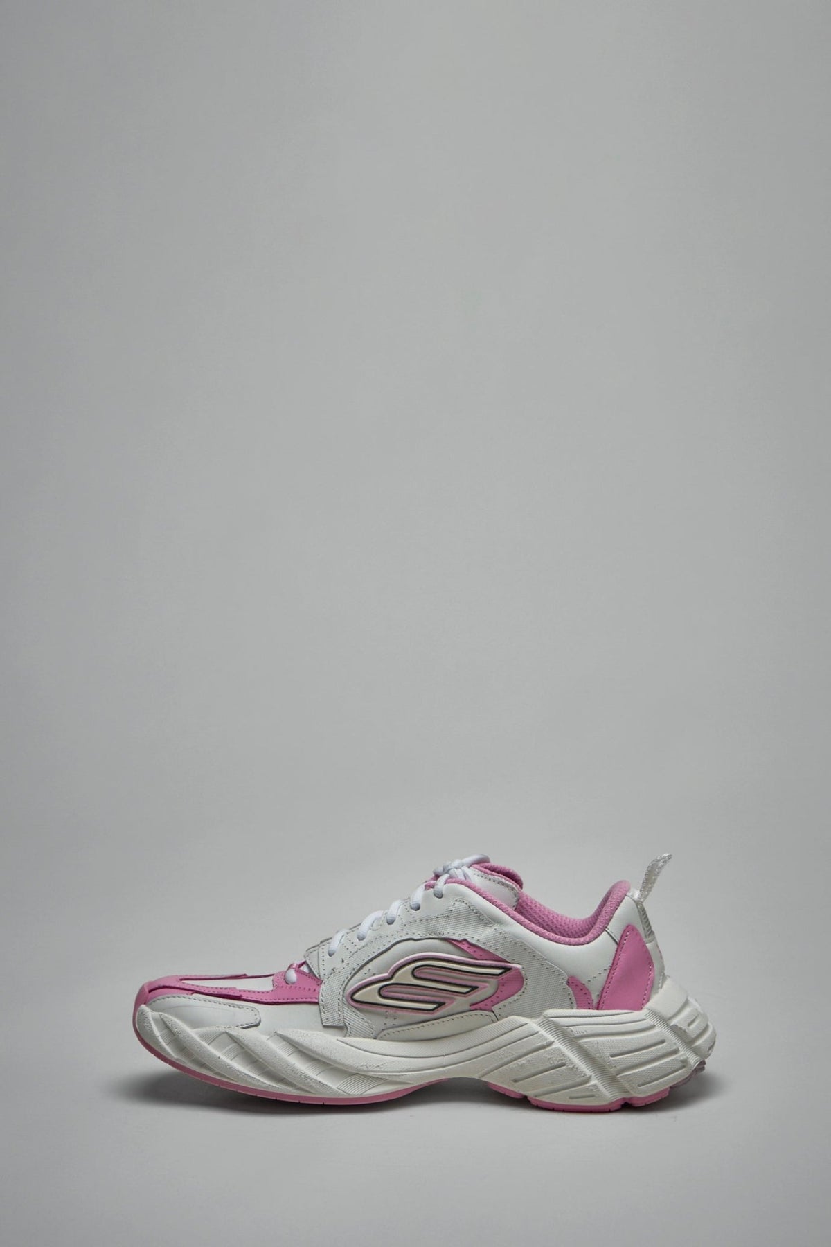 Balenciaga sneakers featuring thick rubber outsole and contrasting color design