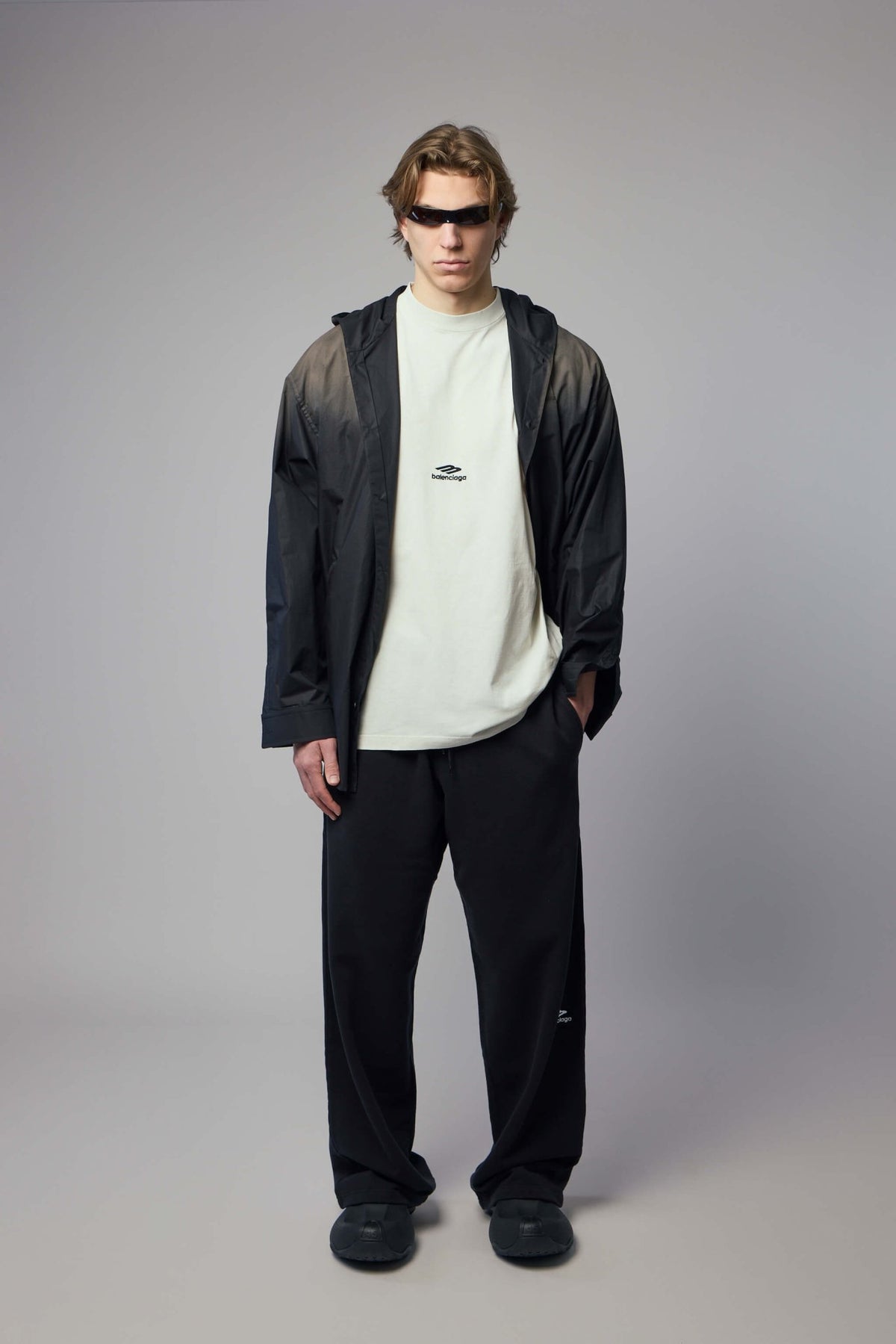 Full outfit styling with Balenciaga oversized T-shirt and complementary pieces