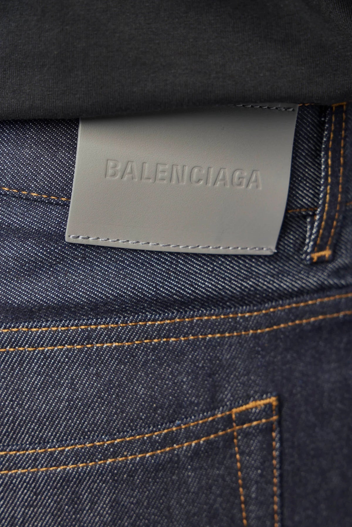 Balenciaga Wide-Leg Jeans styled with casual outerwear