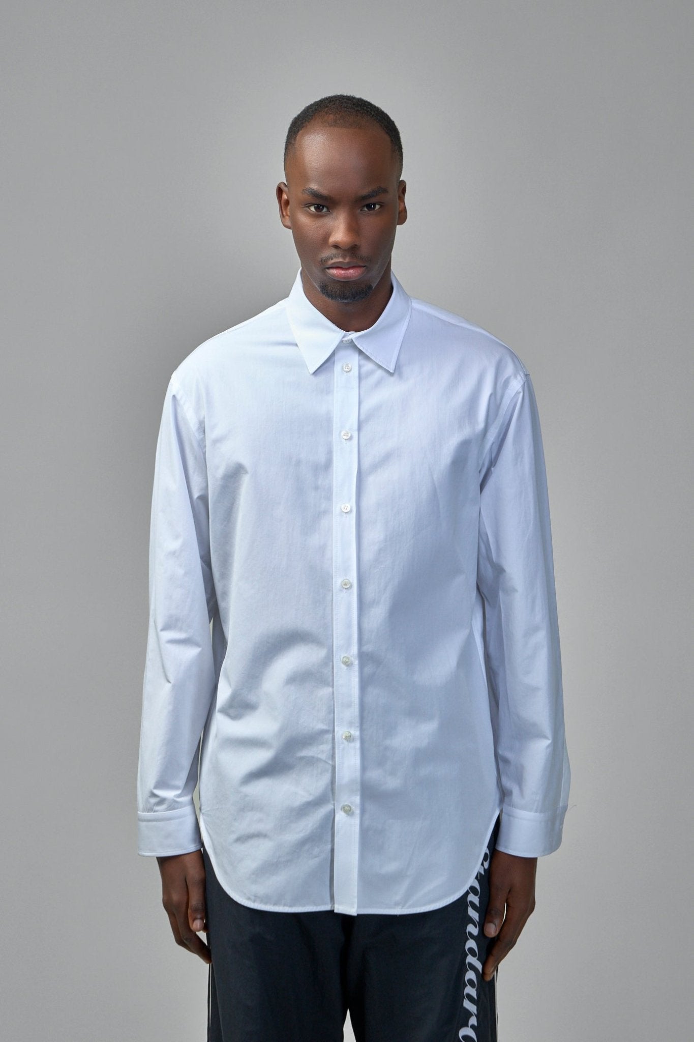 balenciaga men's dress shirt Monogram Button-Up Long Sleeve out details high zipped collar 7 button front 1 patch pocket at chest long sleeves buttoned cuffs rounded hem balenciaga engraved buttons balenciaga logo embroidered on right sleeve made in italy BALENCIAGA - Layered-effect shirt |